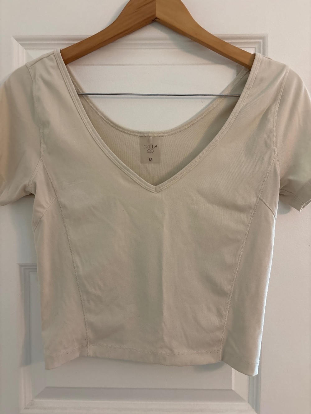 Calia cream cropped v-neck shirt